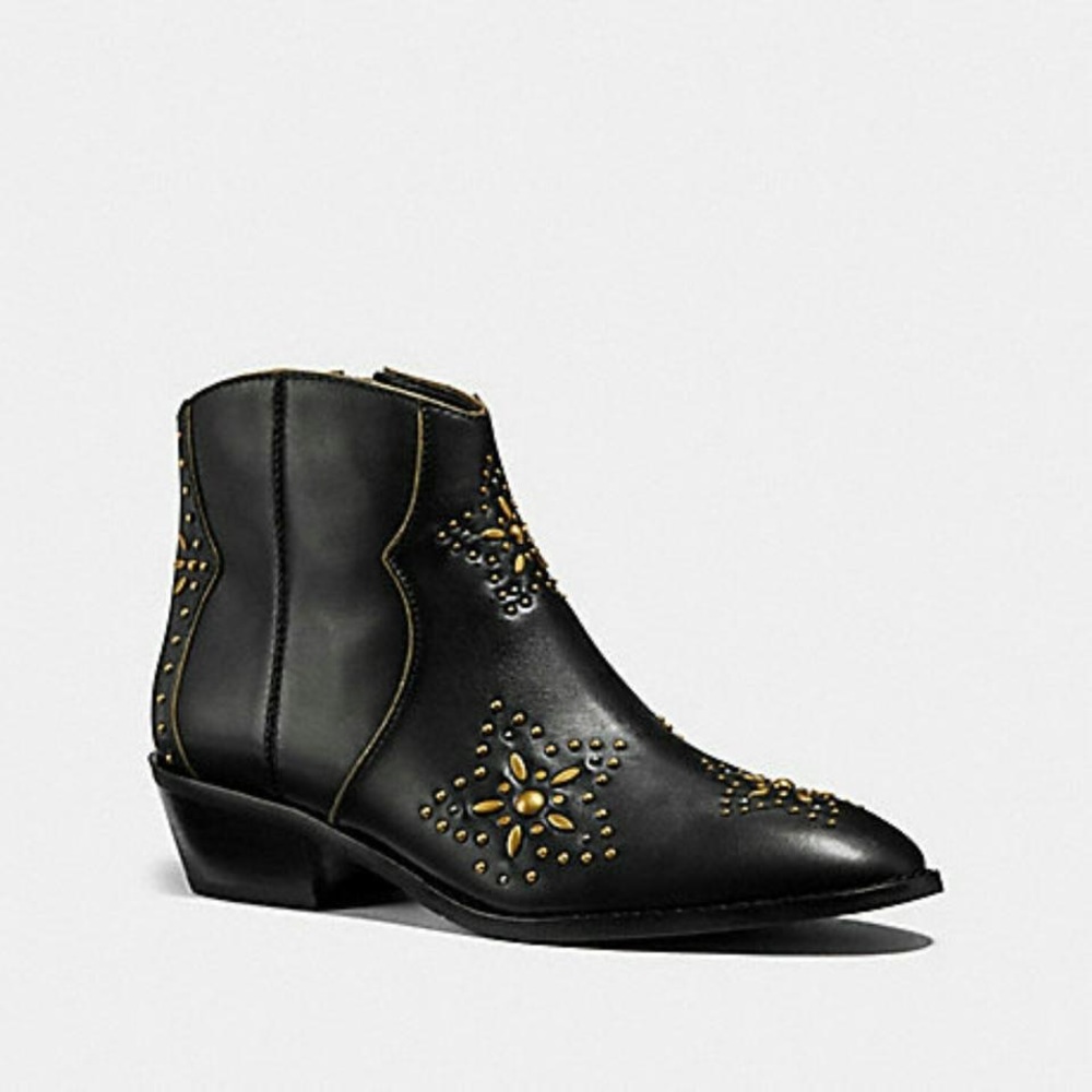 Black Coach bootie with gold detail